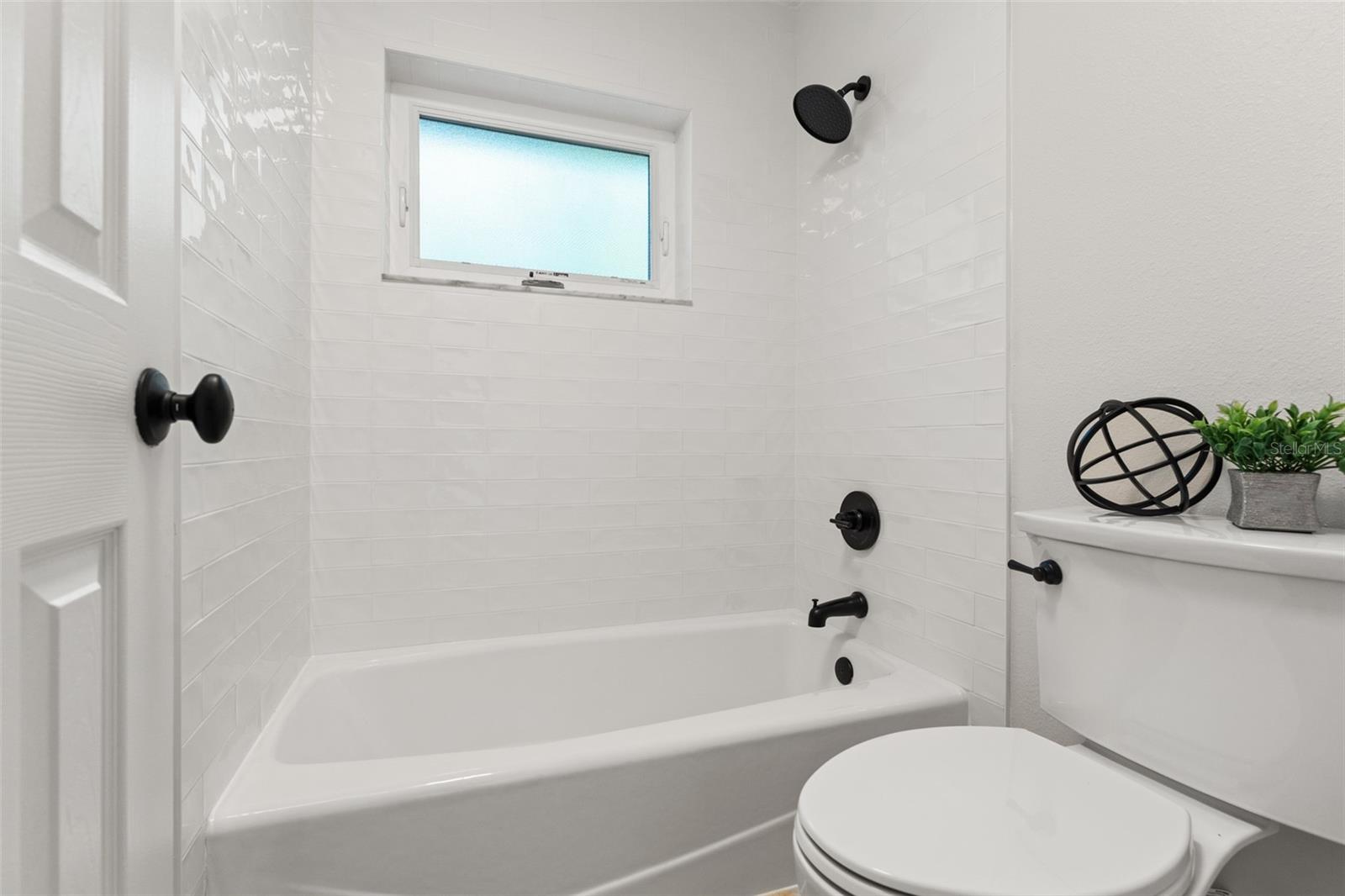 NEW Handcrafted Tiles in Bath, NEWLY Glazed Metal Bathtub, NEW Matte-Black Metal Hardware.