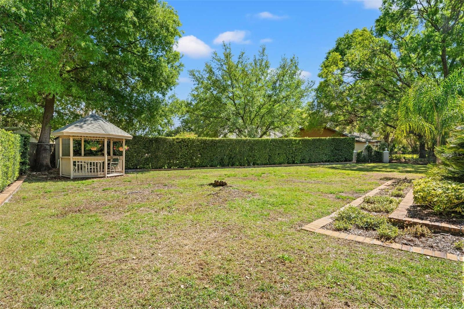 Paved and Terraced Garden Beds along the rear of Lanai