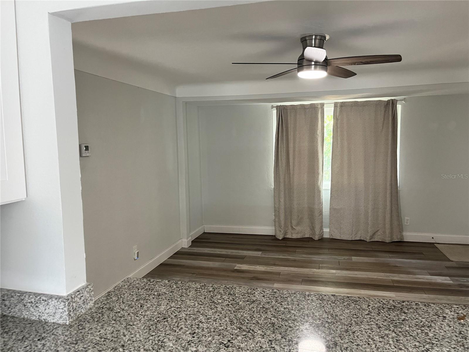 vacant living room from kitchen