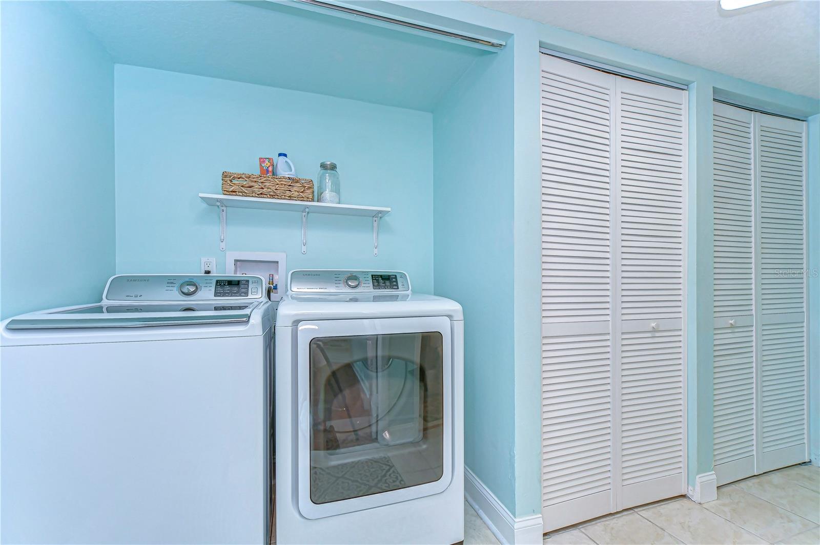 Featuring modern appliances that make chores a breeze, this space invites you to tackle your laundry pile with newfound enthusiasm.