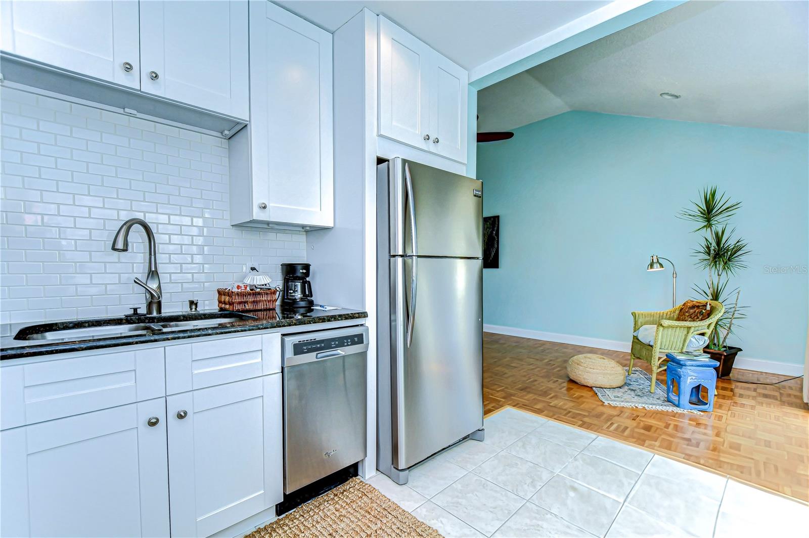 The subway tile backsplash adds a modern flair, perfectly balancing charm with practicality.