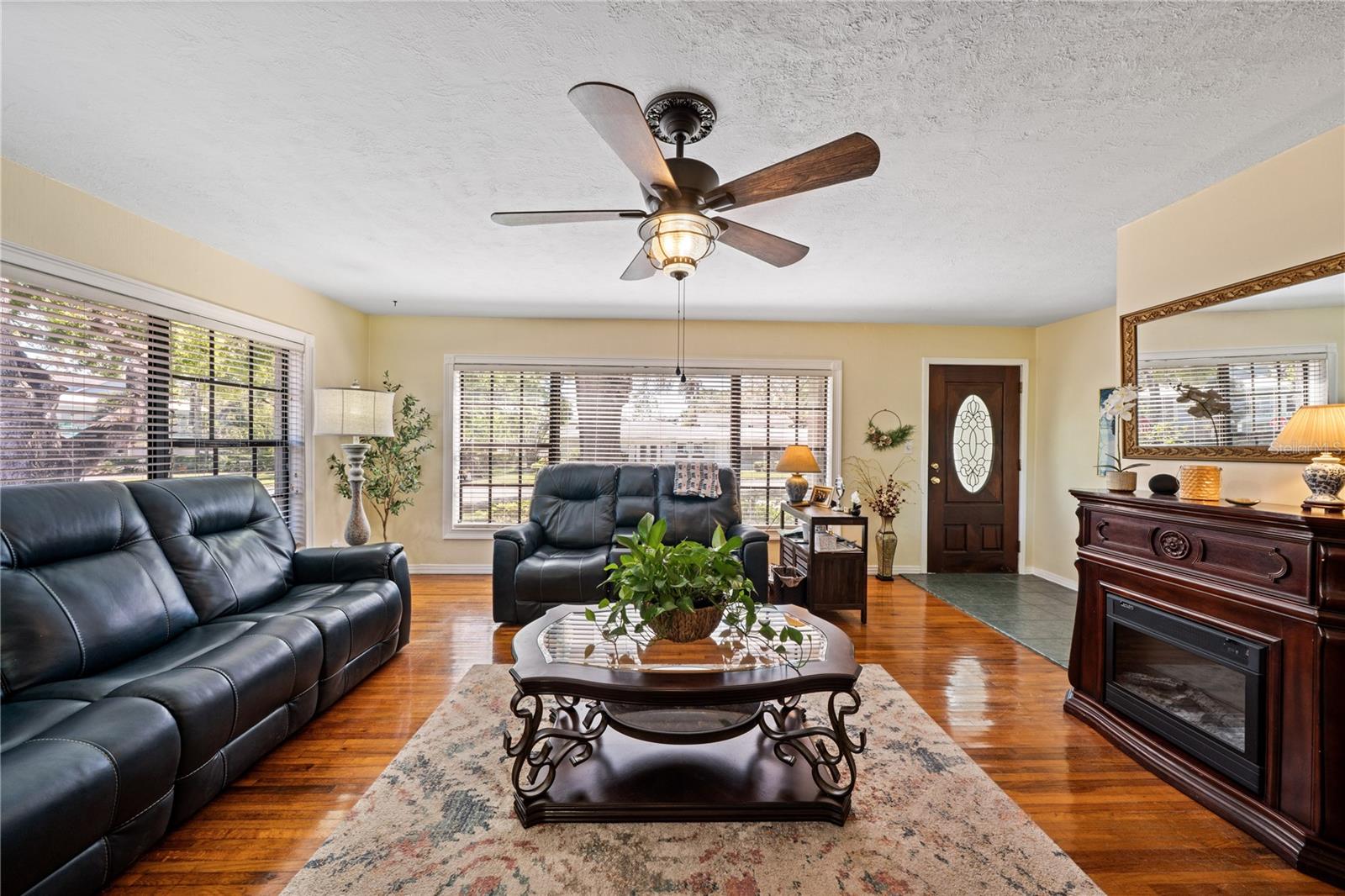 Gorgeous living room with beaming hardwood floors