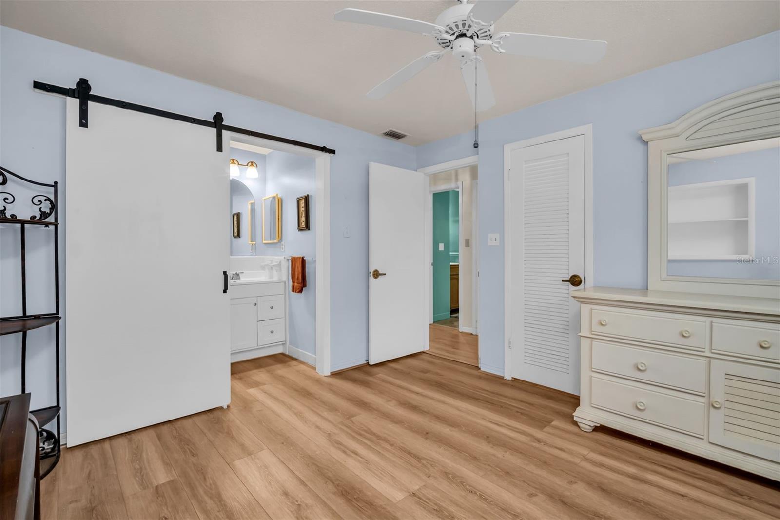 With sliding barn doors.