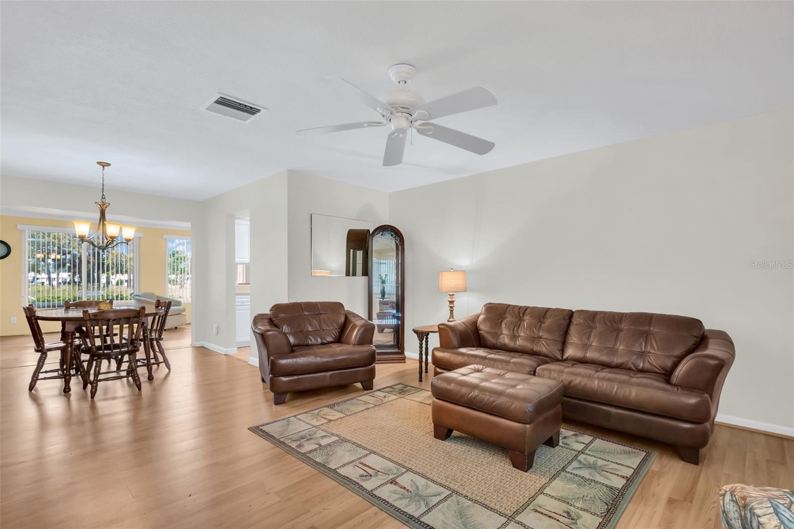 Living dining combination. Many open up wall to kitchen