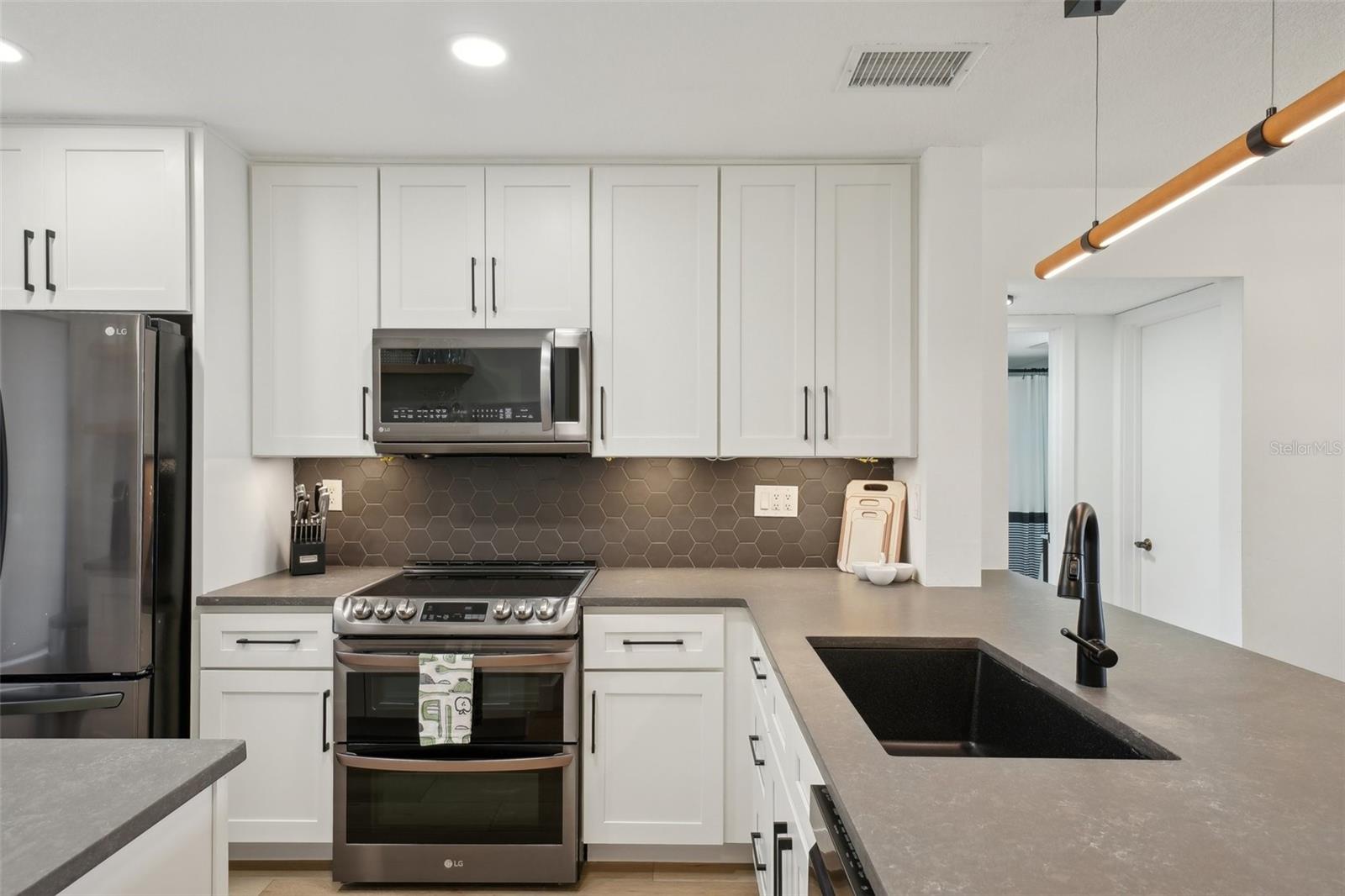 Gorgeous backsplash and quartz counters