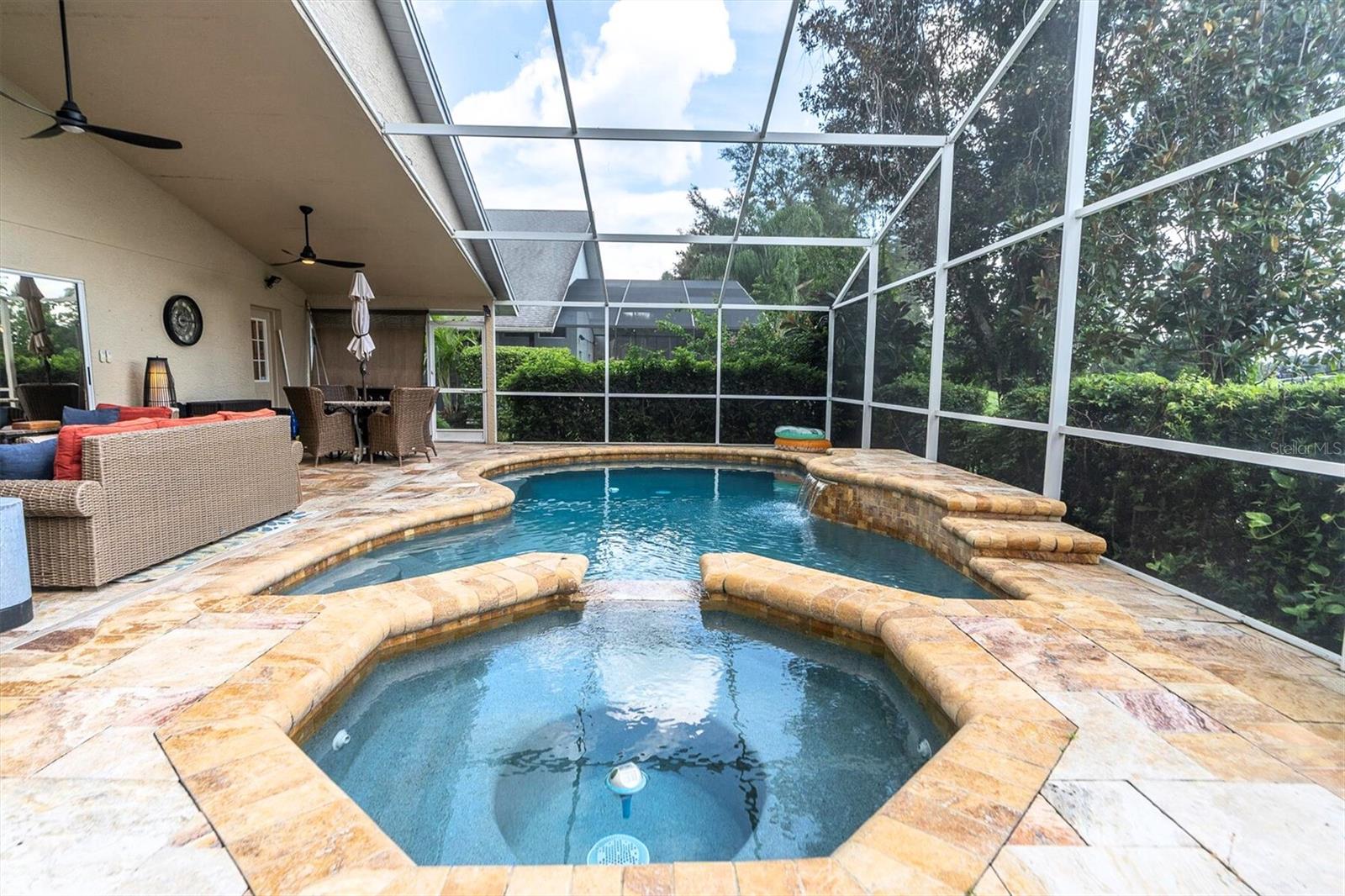 Custom Sunsation Pool and Spa w/Custom Travertine Decking