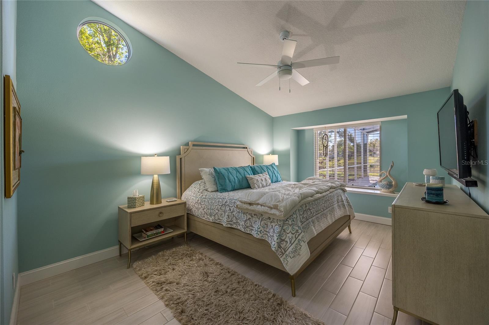 THE LUXURIOUS AND HUGE MASTER BEDROOM OVERLOOK THE POOL & POND! WITH AN EN-SUITE BATHROOM!