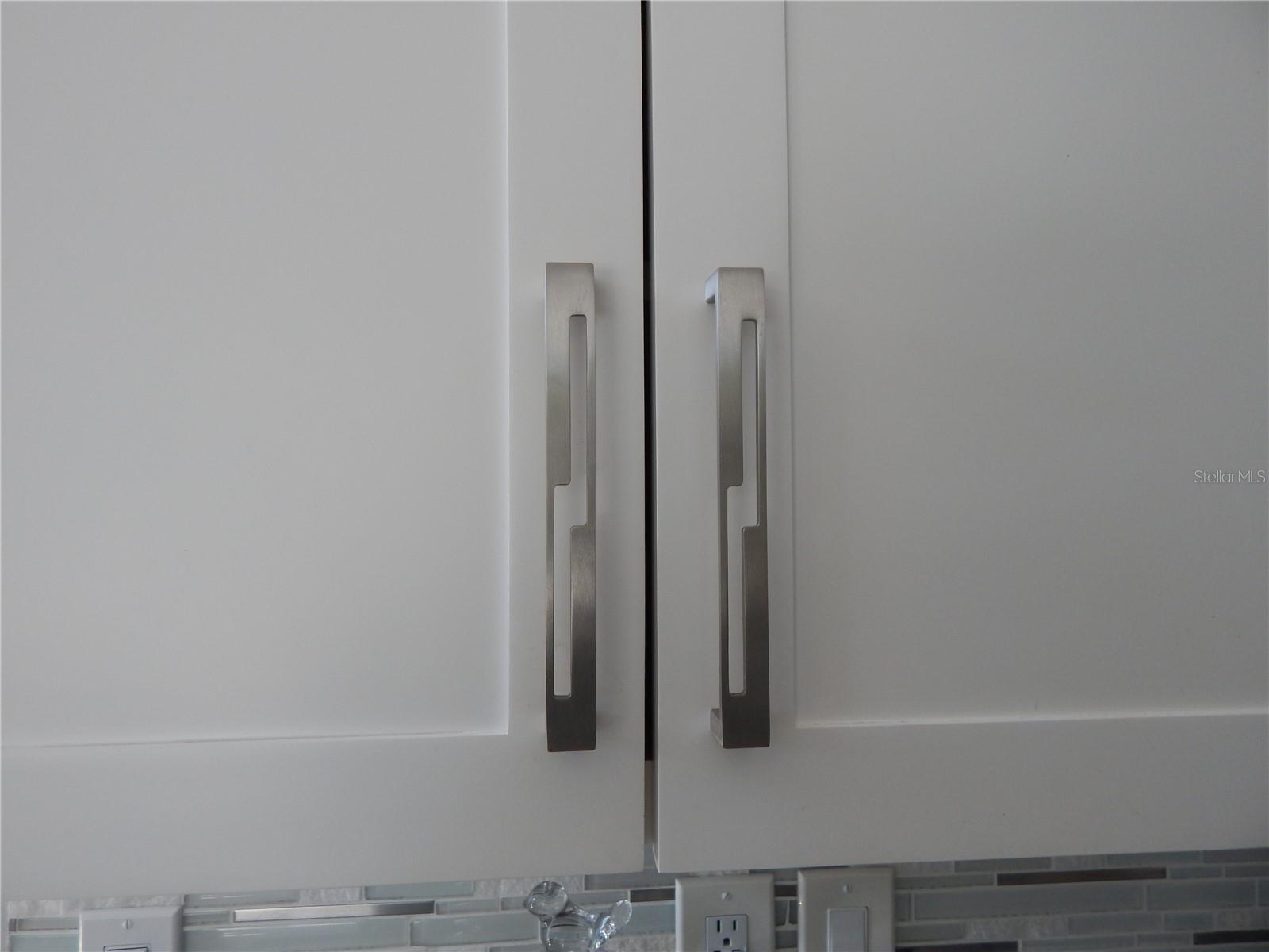 DESIGNER HARDWARE ON KITCHEN CABS & HALL LINEN CLOSET!