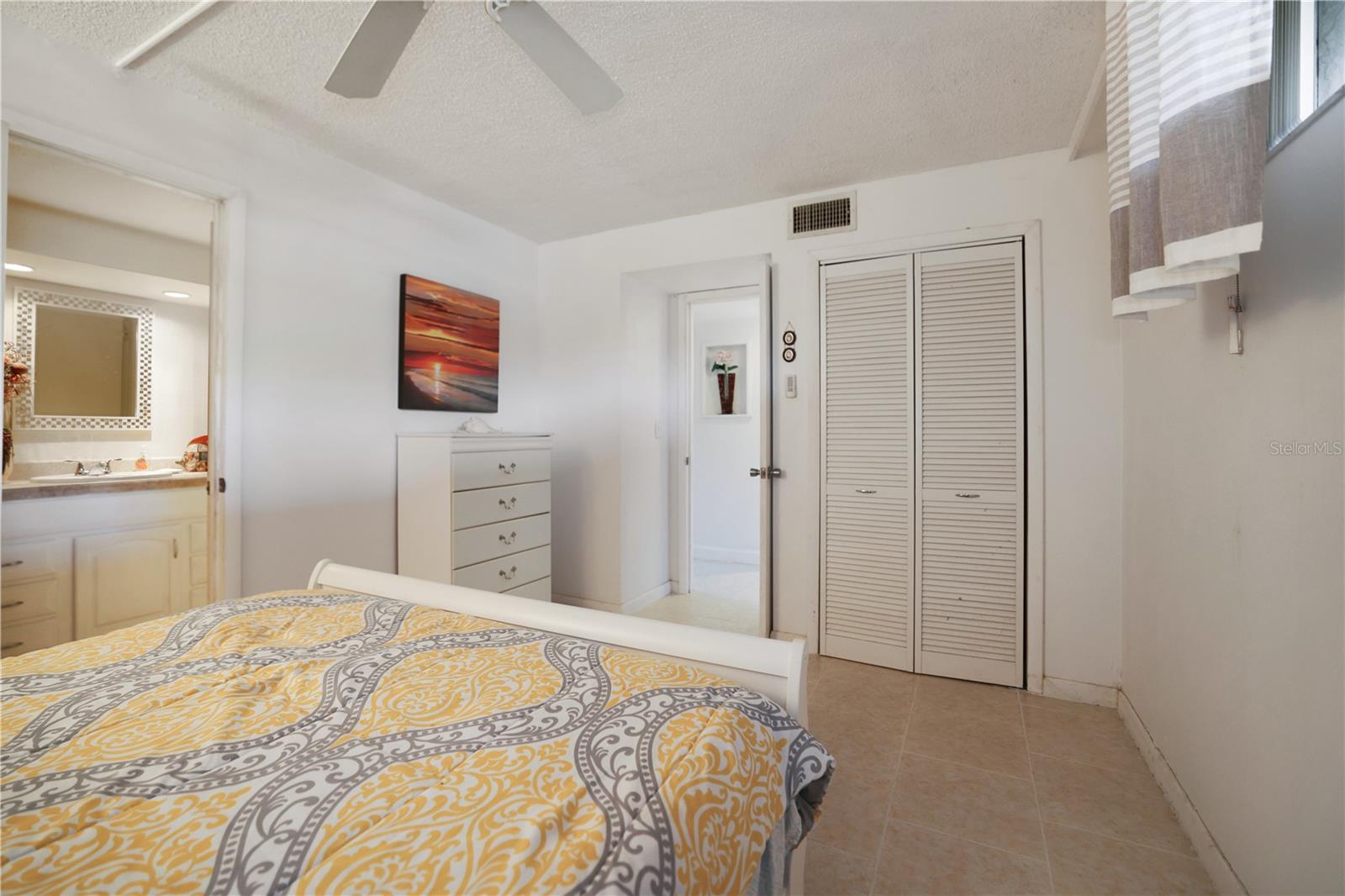 Guest bedroom with connected guest bath