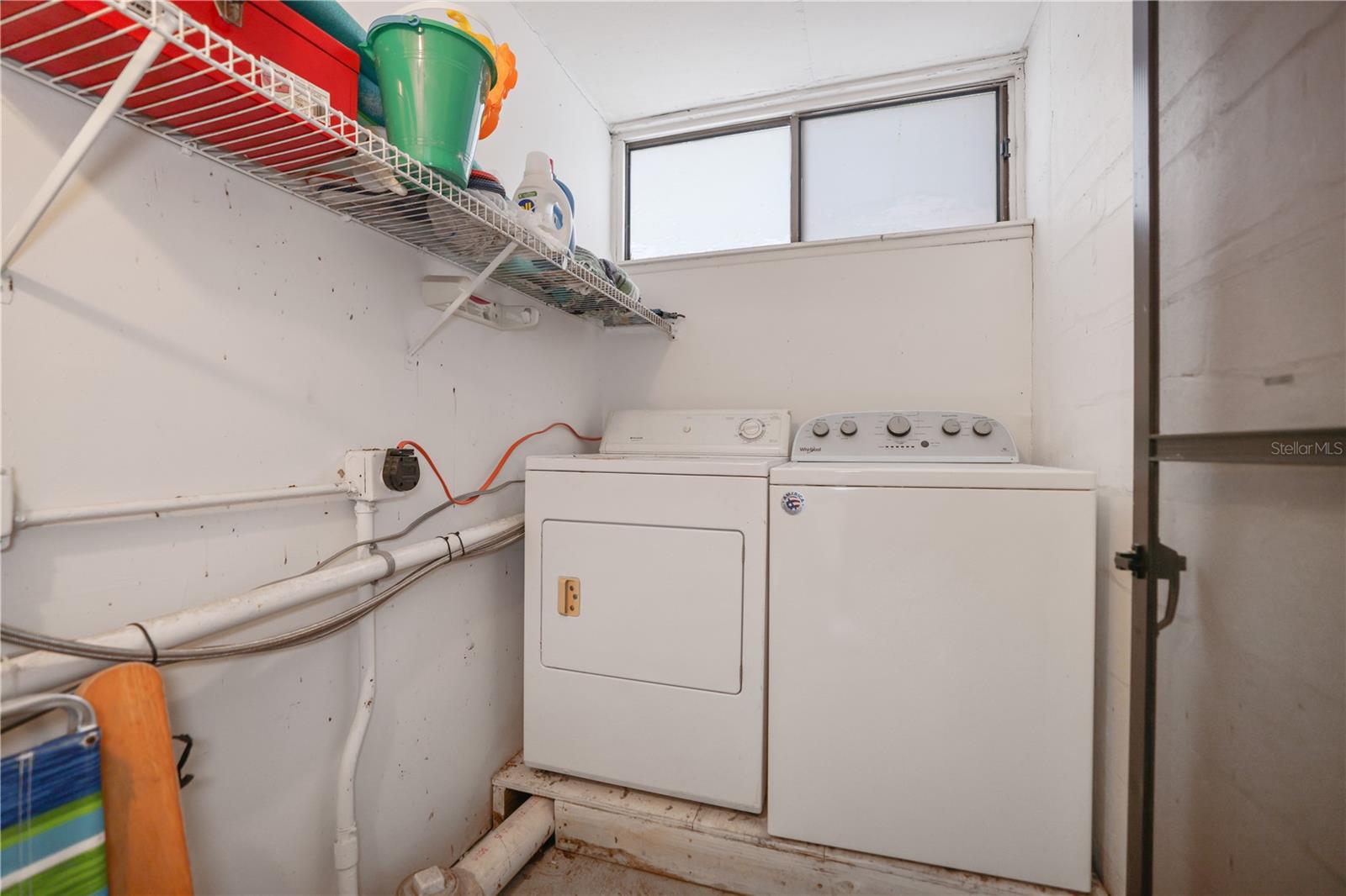 Separate laundry room and storage room only for this unit