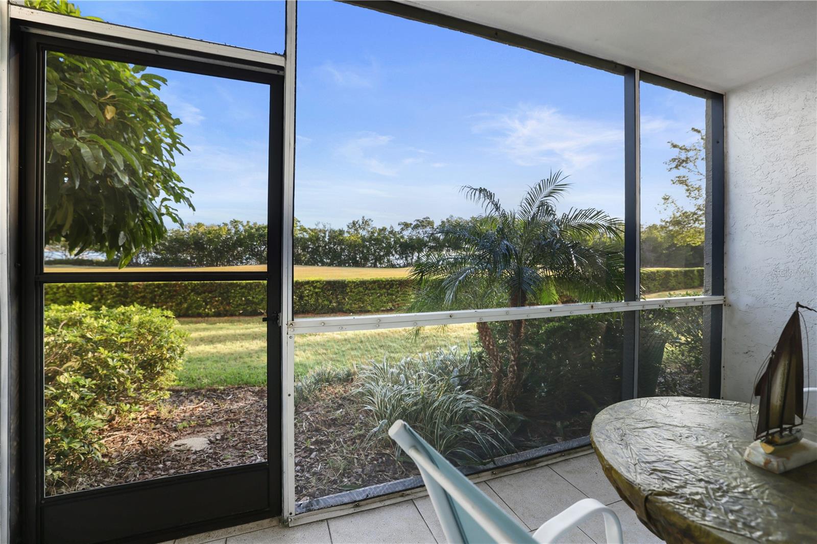 Screened-in patio out back