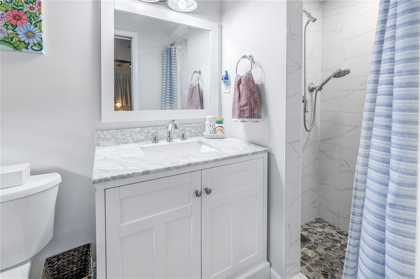En-suite bath for bedroom number three