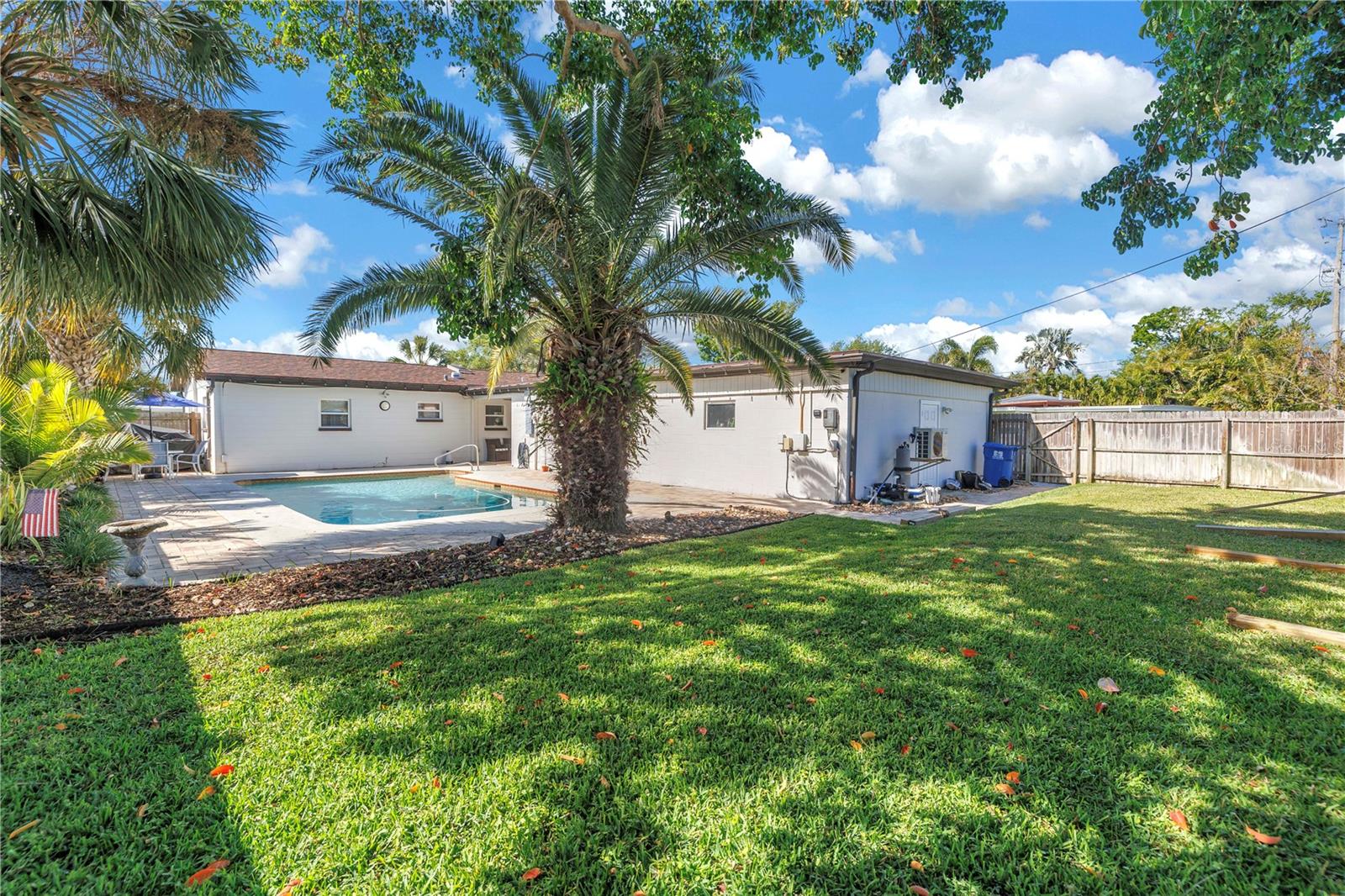 Oversized yard and saltwater pool complete this wonderful oasis!