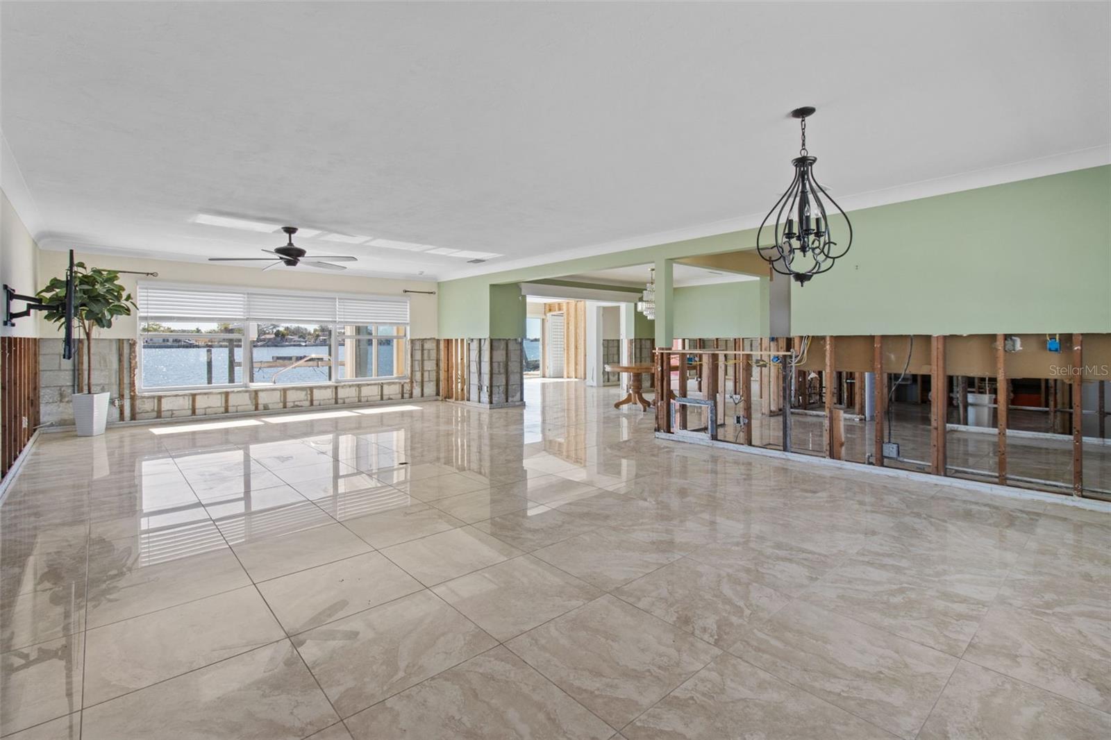 This is the living room or great room that has wide open views to the water