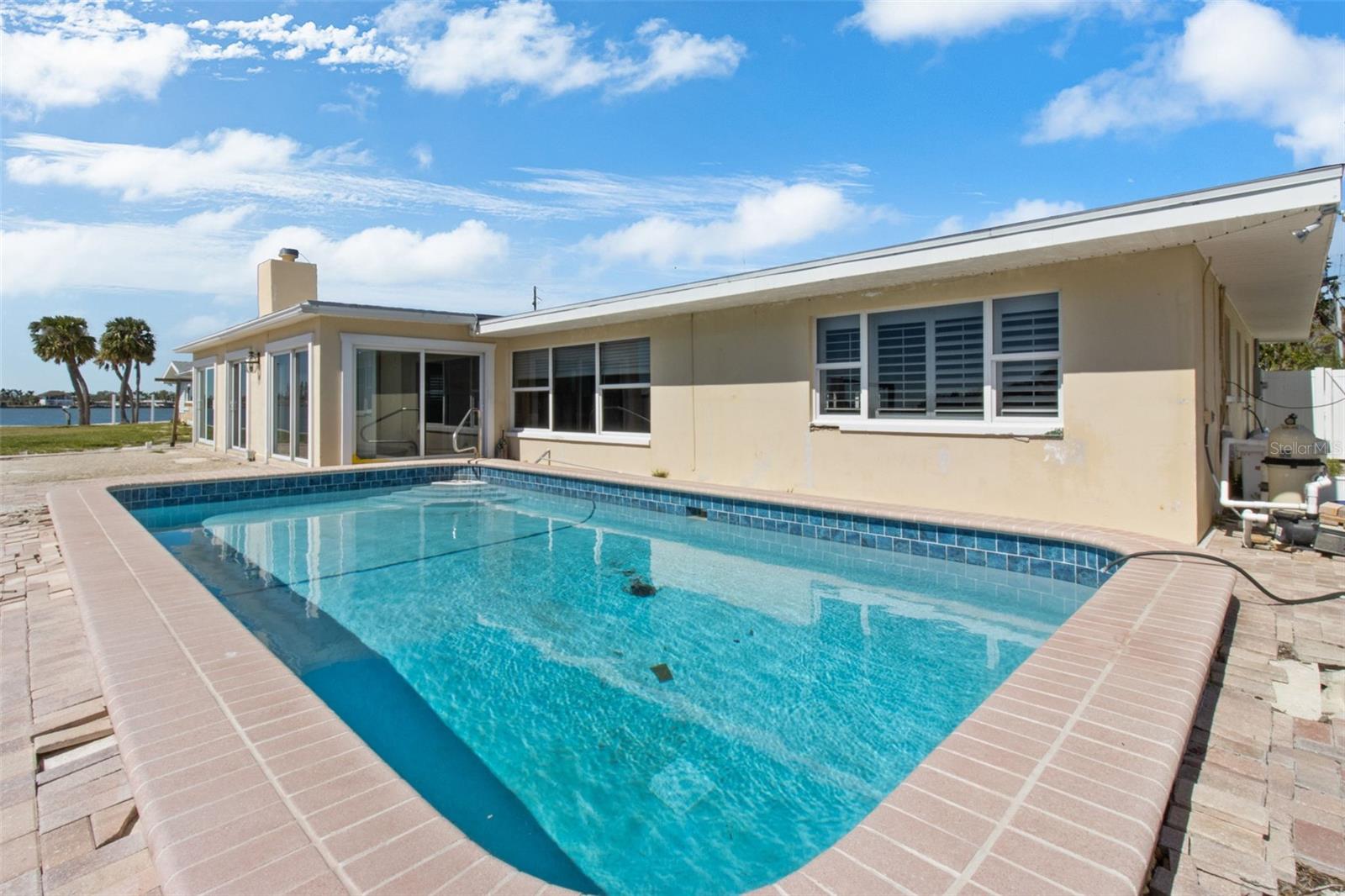 Another look at this nice pool that this waterfront home has.