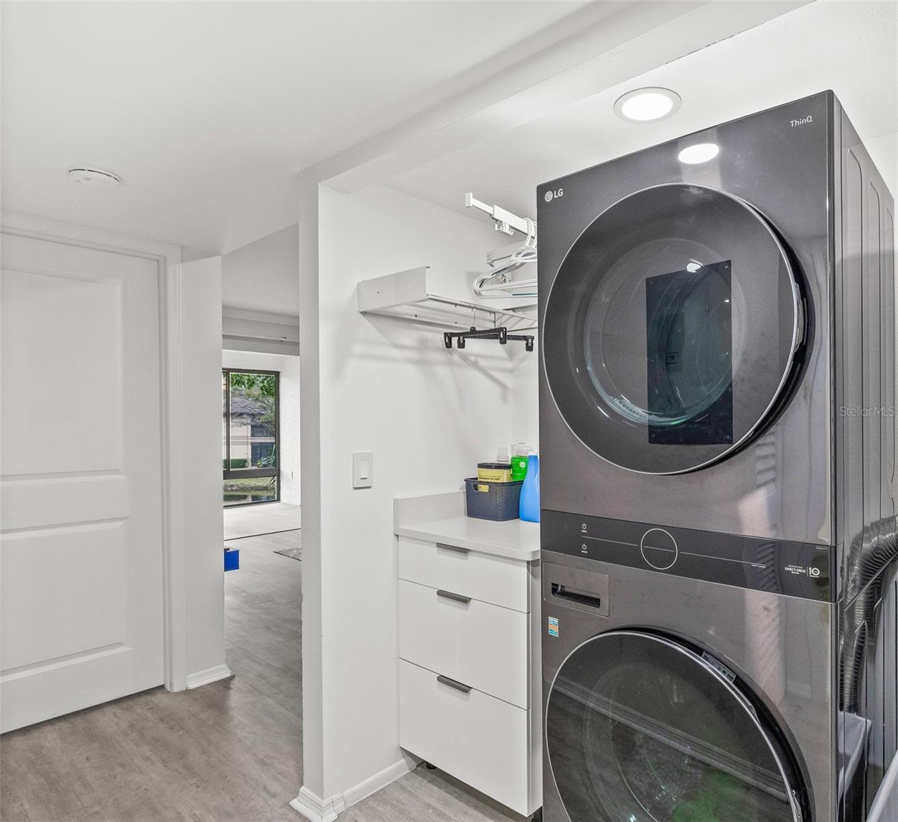 Smart feature washer and dryer. Added additional cabinet for your convenience and also drying rack.  Tankless water  heater and electric panel installed in the unit.