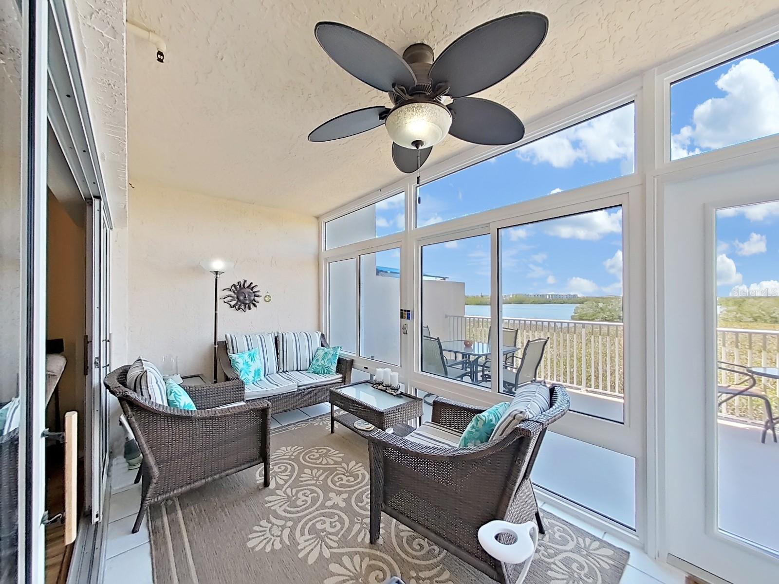 Enclosed lanai is perfect year-round Florida room