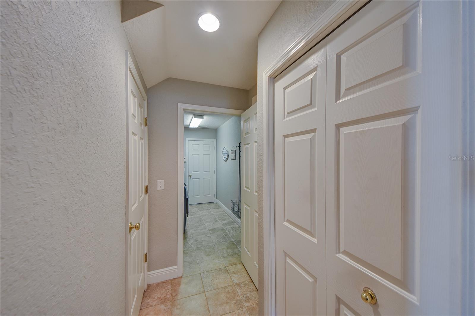 Pantry and Entry to Indoor Laundry Room