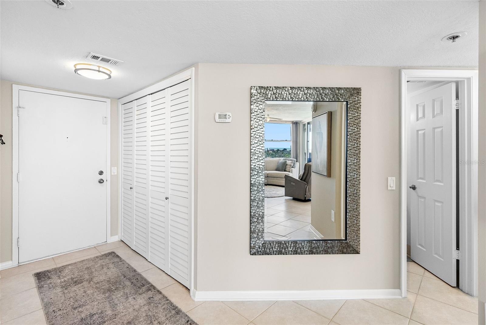 Welcome home to luxury living with an elegant tiled entry and coastal details throughout.