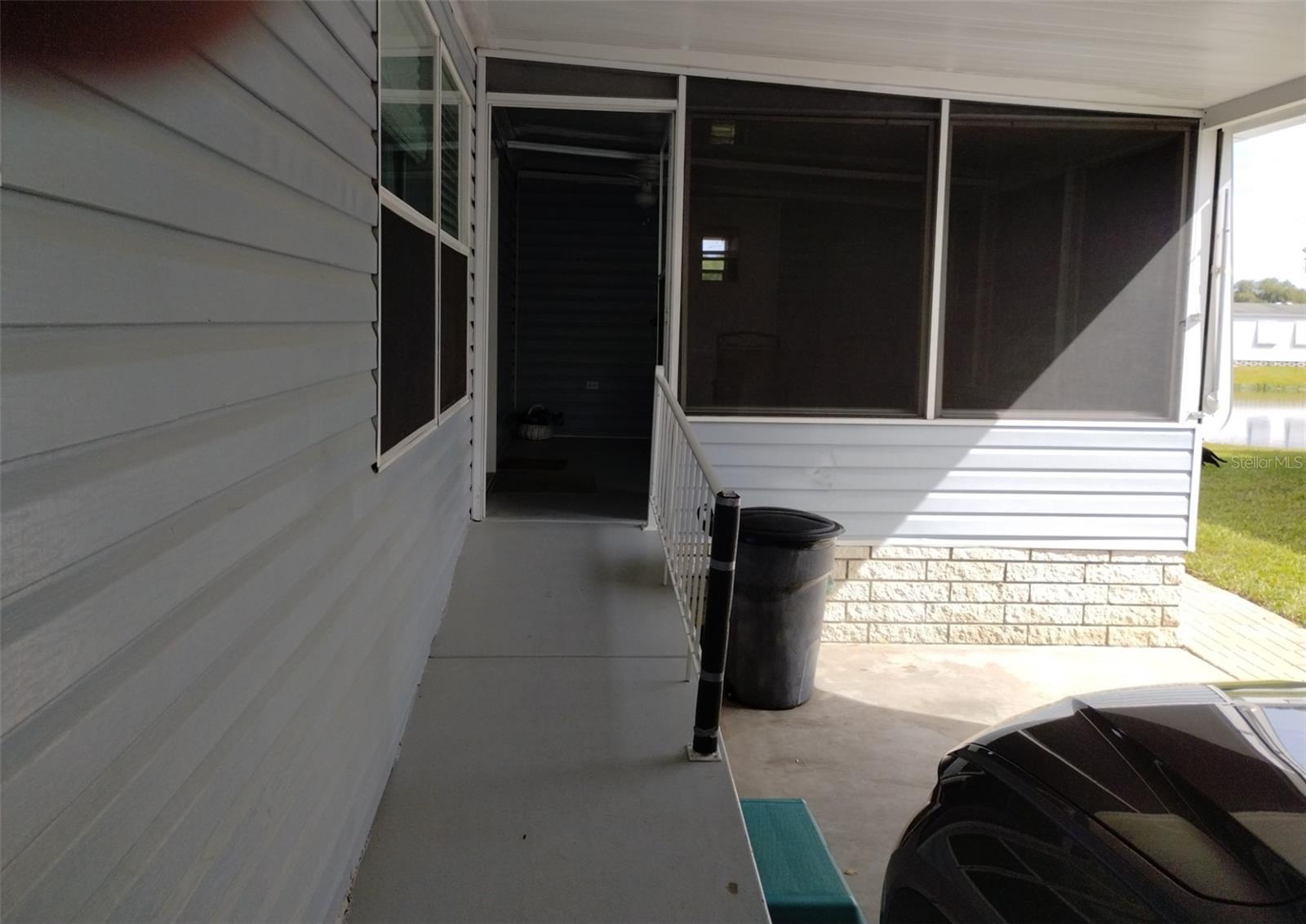 Screen Enclosed Porch and Side Entrance to home