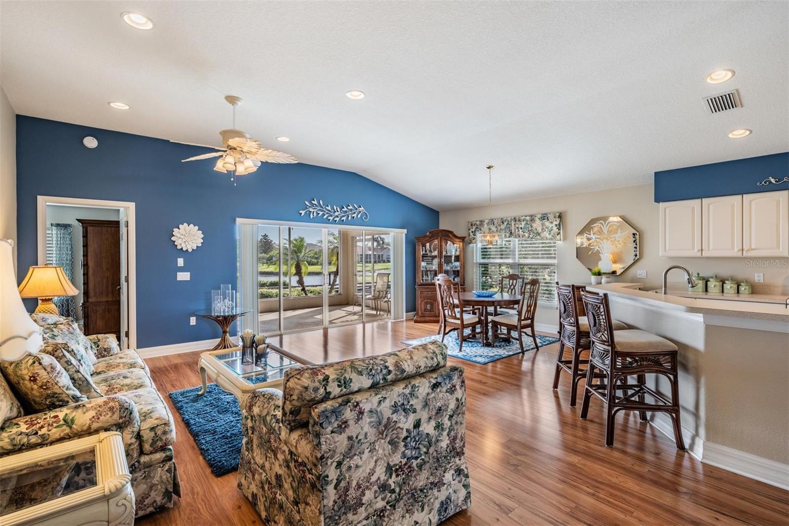 Living area with lanai and water views