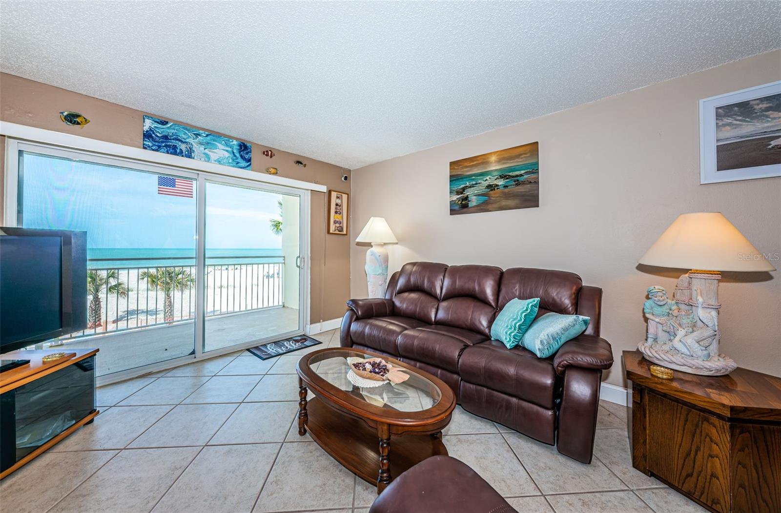 No matter where you sit in the living room, you have a great view of the beach and the Gulf of Mexico
