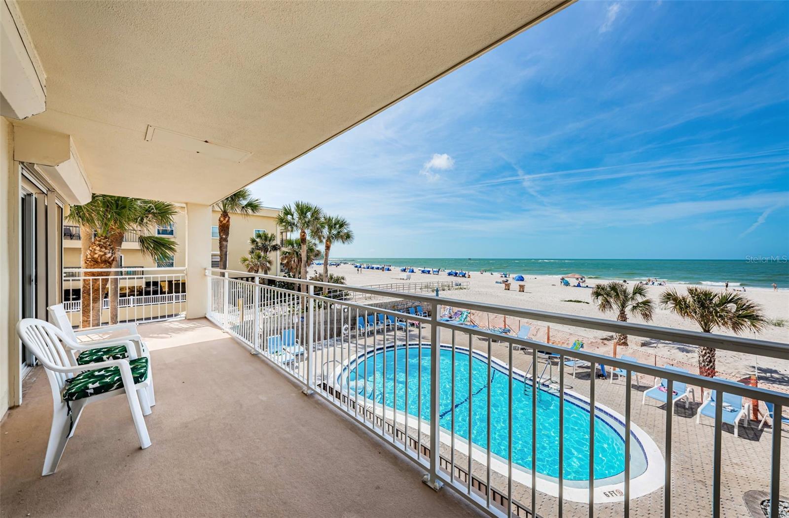 Large balcony overlooking the pool