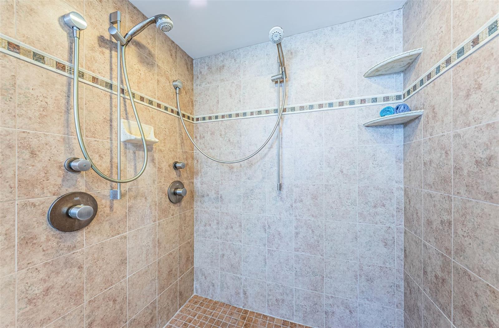 large walk-in shower in the primary bathroom