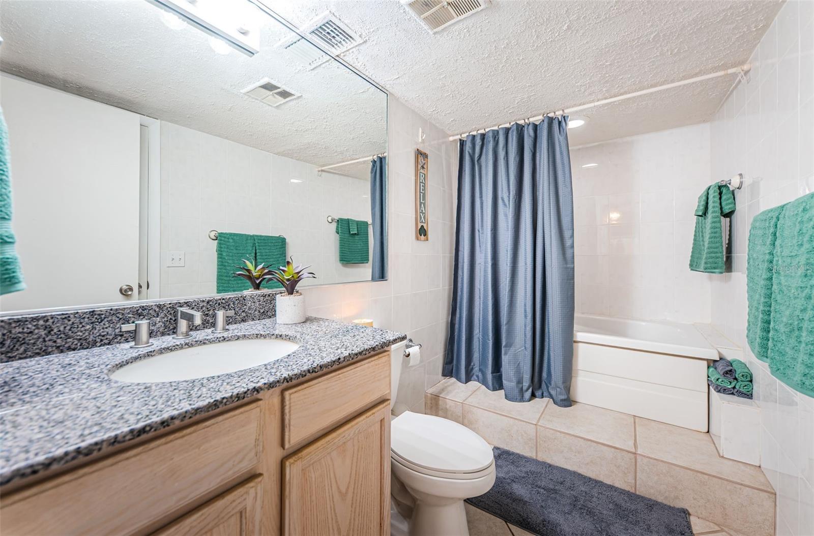 Second Bath with tub and shower