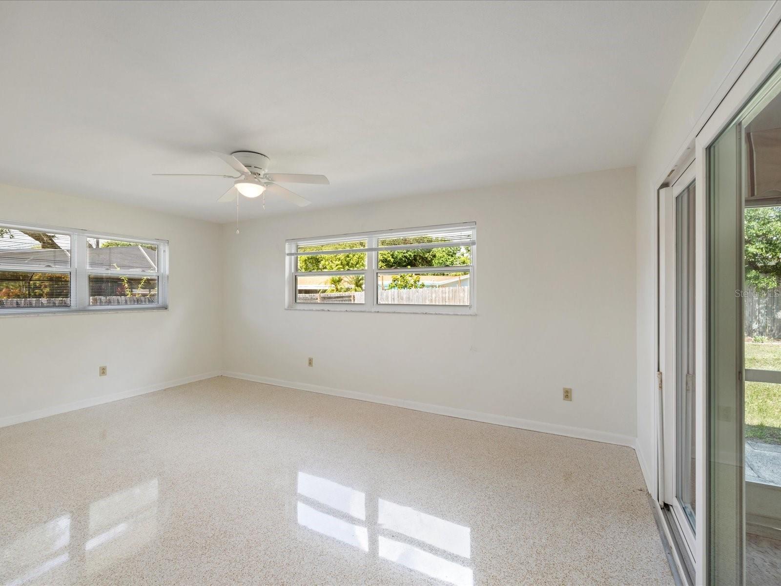 Primary suite with sliders to lanai