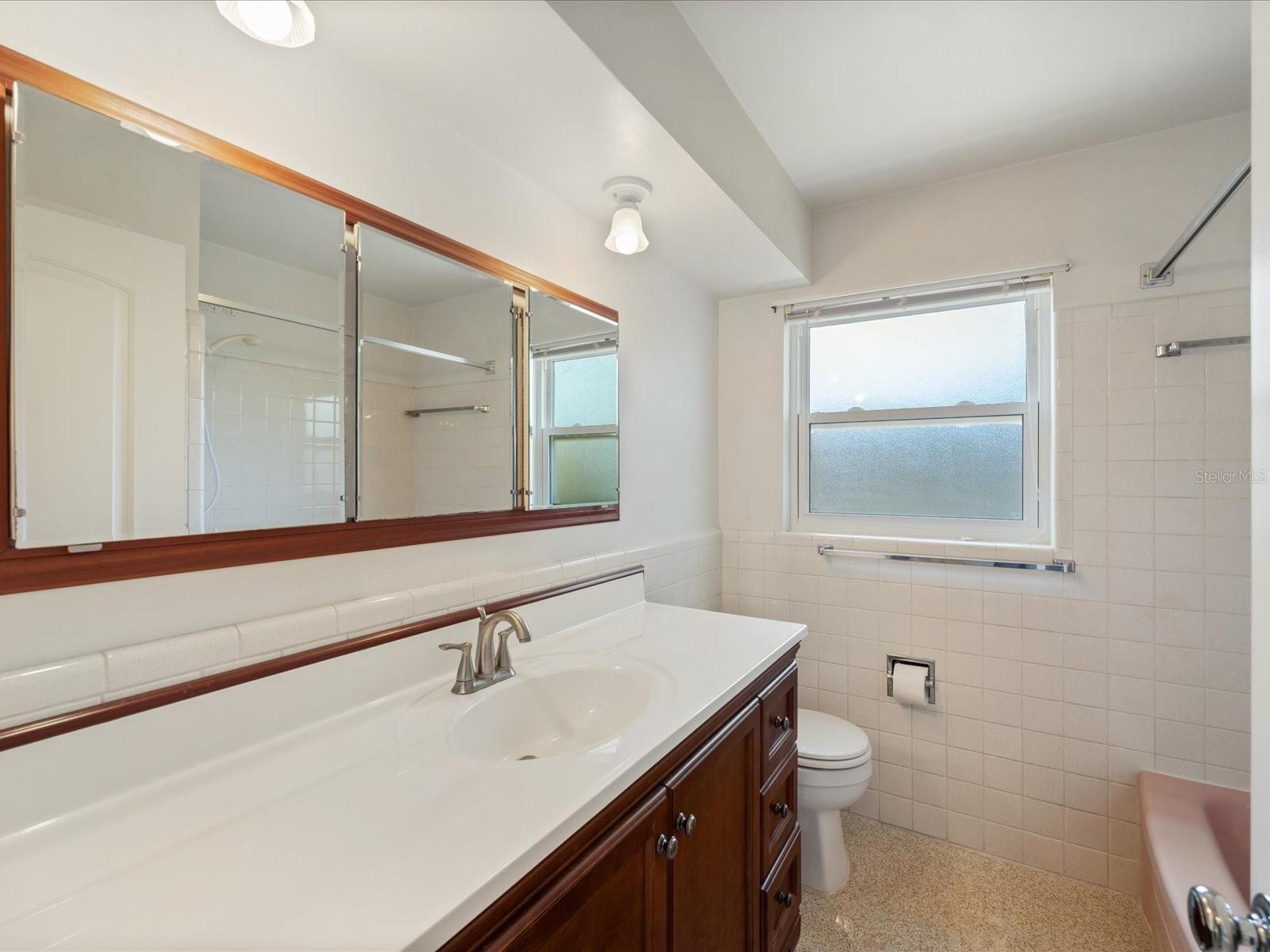 Hall bath with tub shower