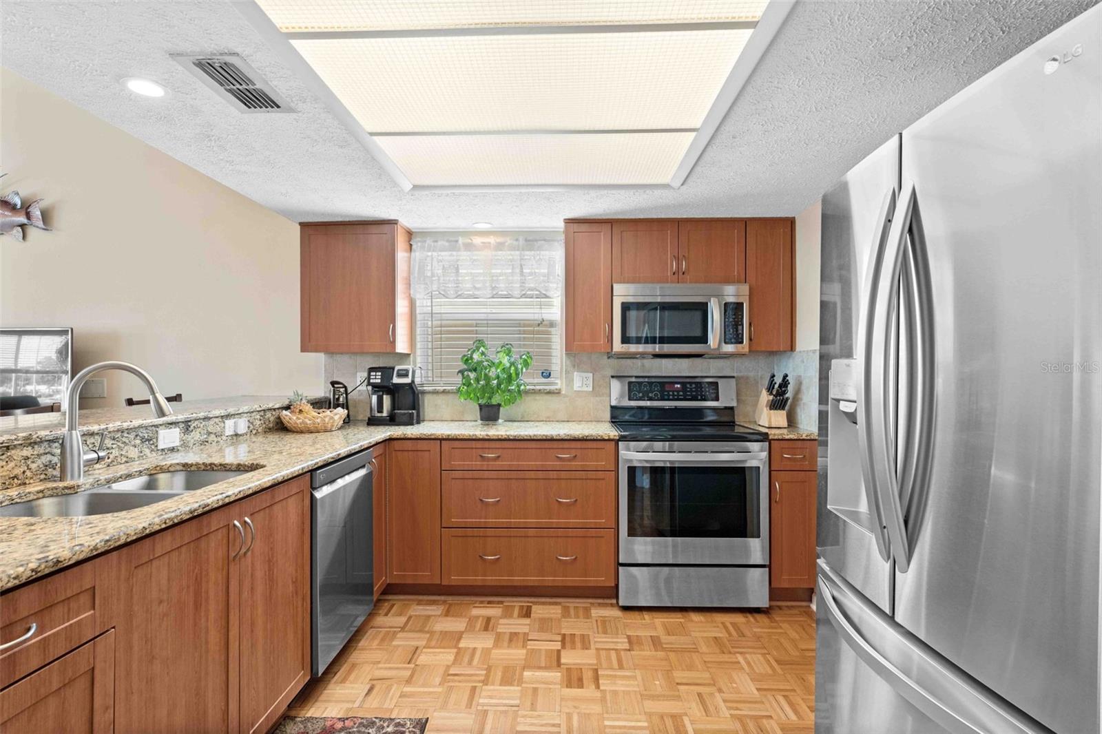 Kitchen Remodeled in 2017 with Contemporary Cabinets, Granite Counters & Stainless Steel Appliances