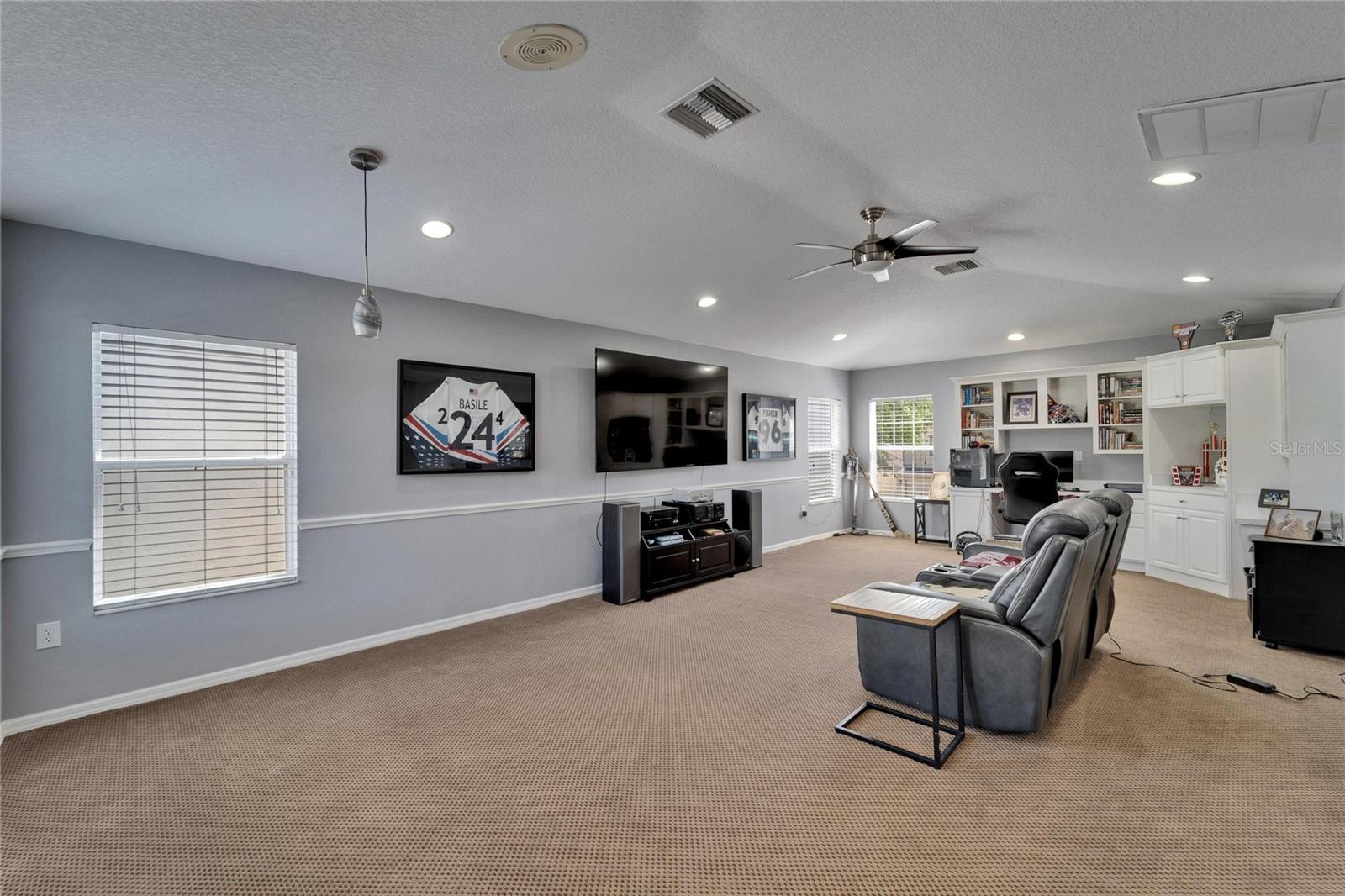 UPSTAIRS IS CURRENTLY A MEDIA ROOM & OFFICE