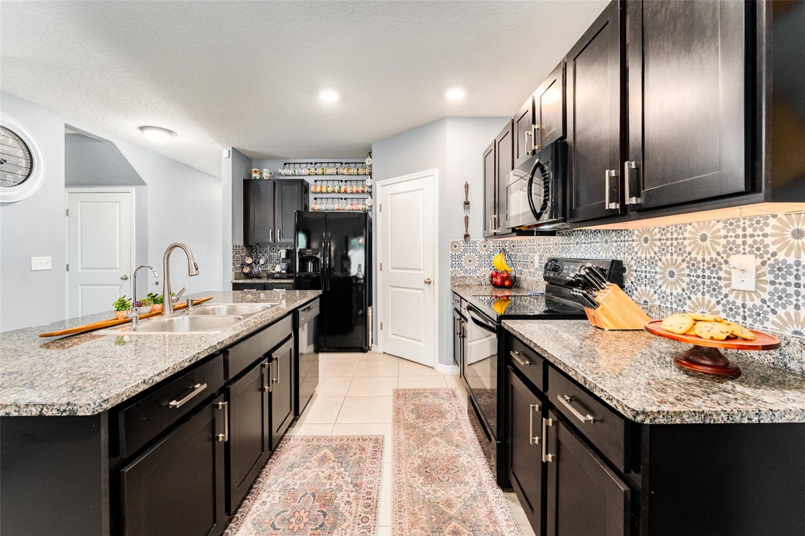 Granite Counter tops/ 42 inch Wood Cabinets