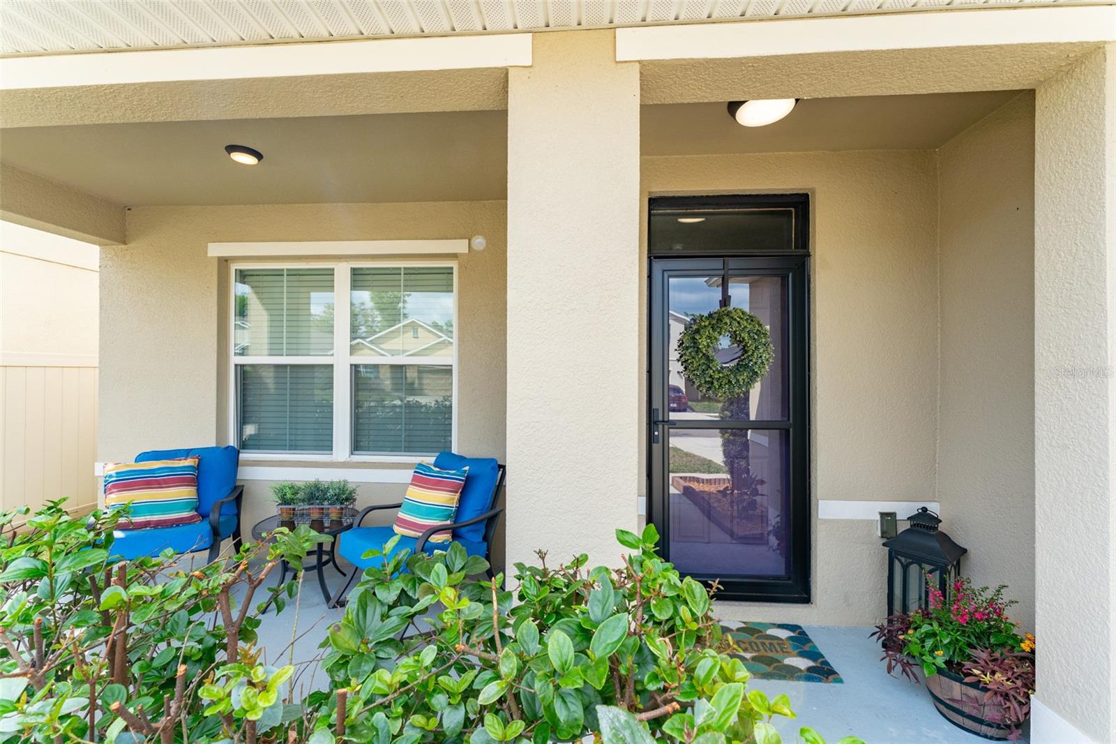 Front Covered Porch and New Storm Door