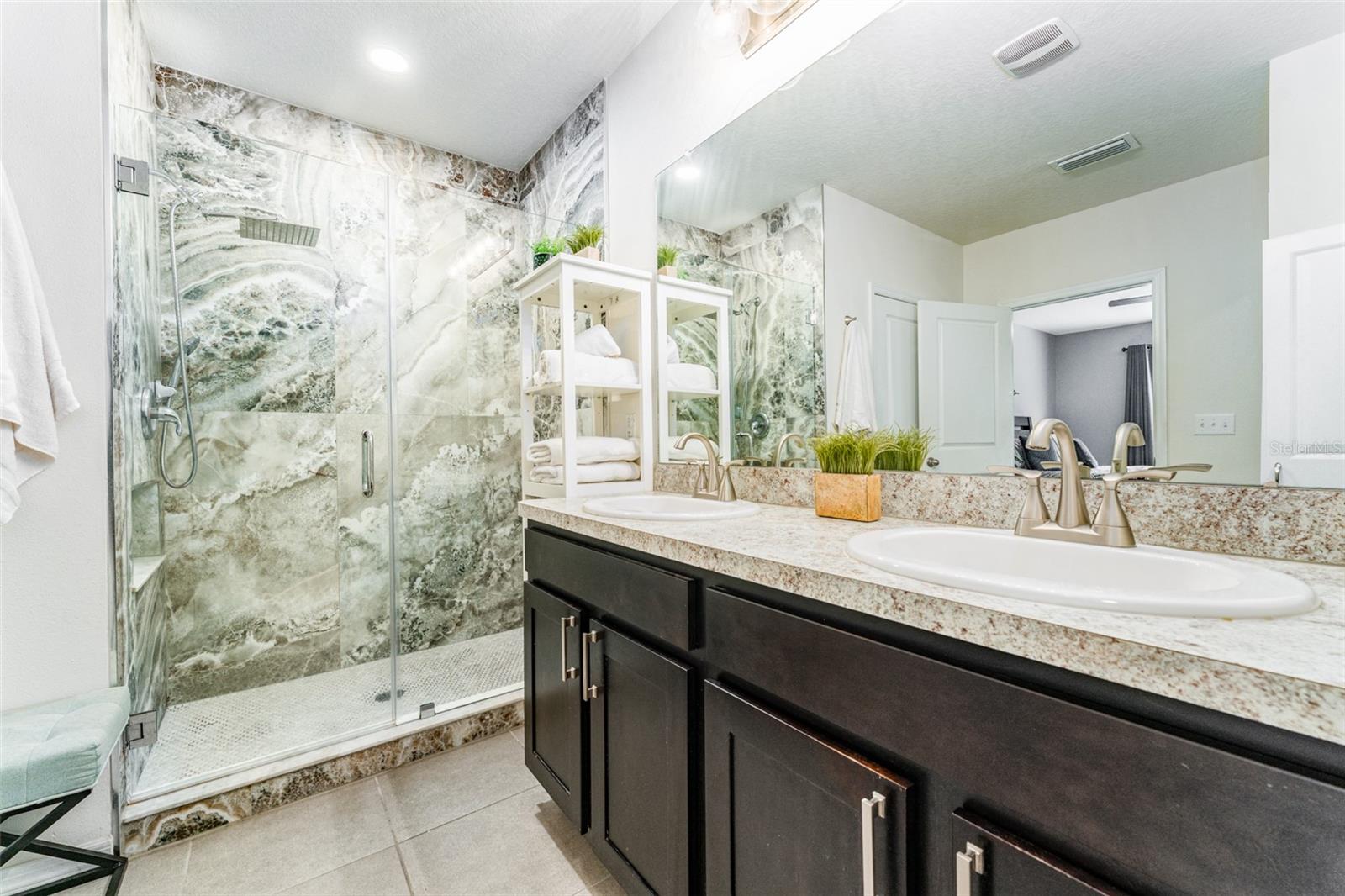 Large walk-in Shower and Custom Closet