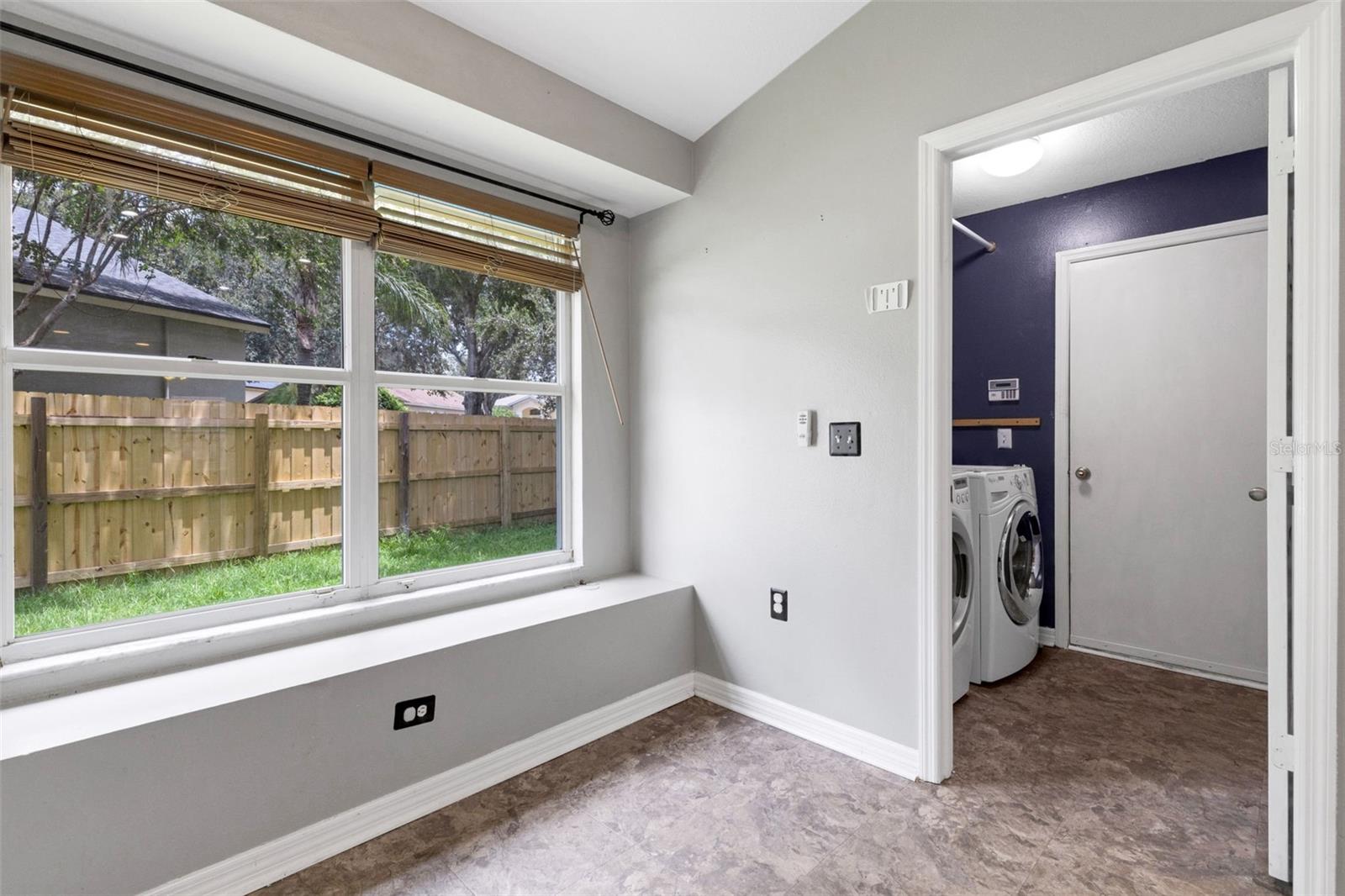 Laundry room off of kitchen breakfast nook