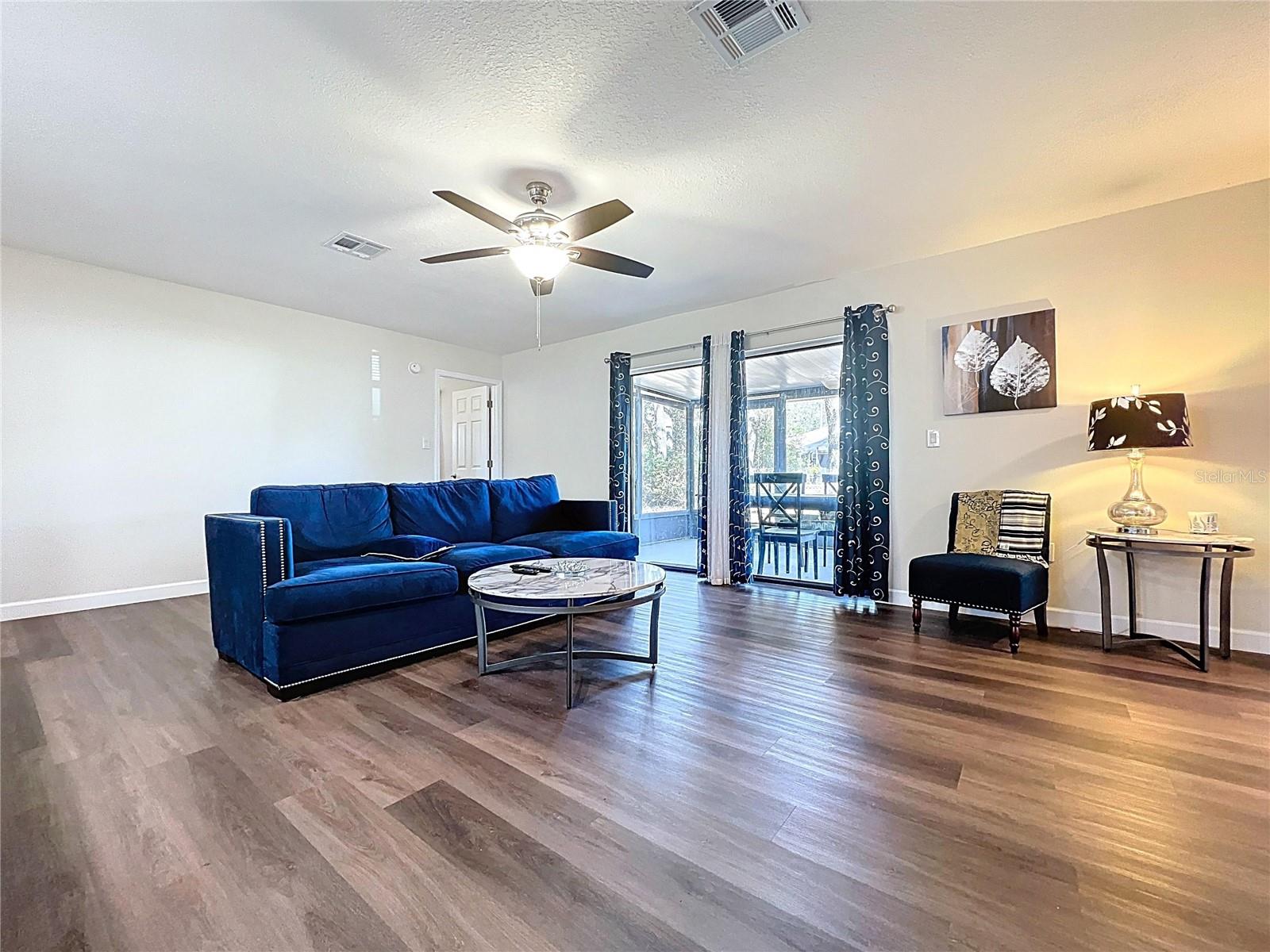 Family room looking towards back lanai which is enclosed