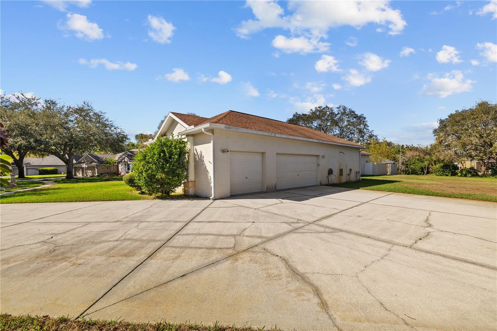Front of House View + Garage