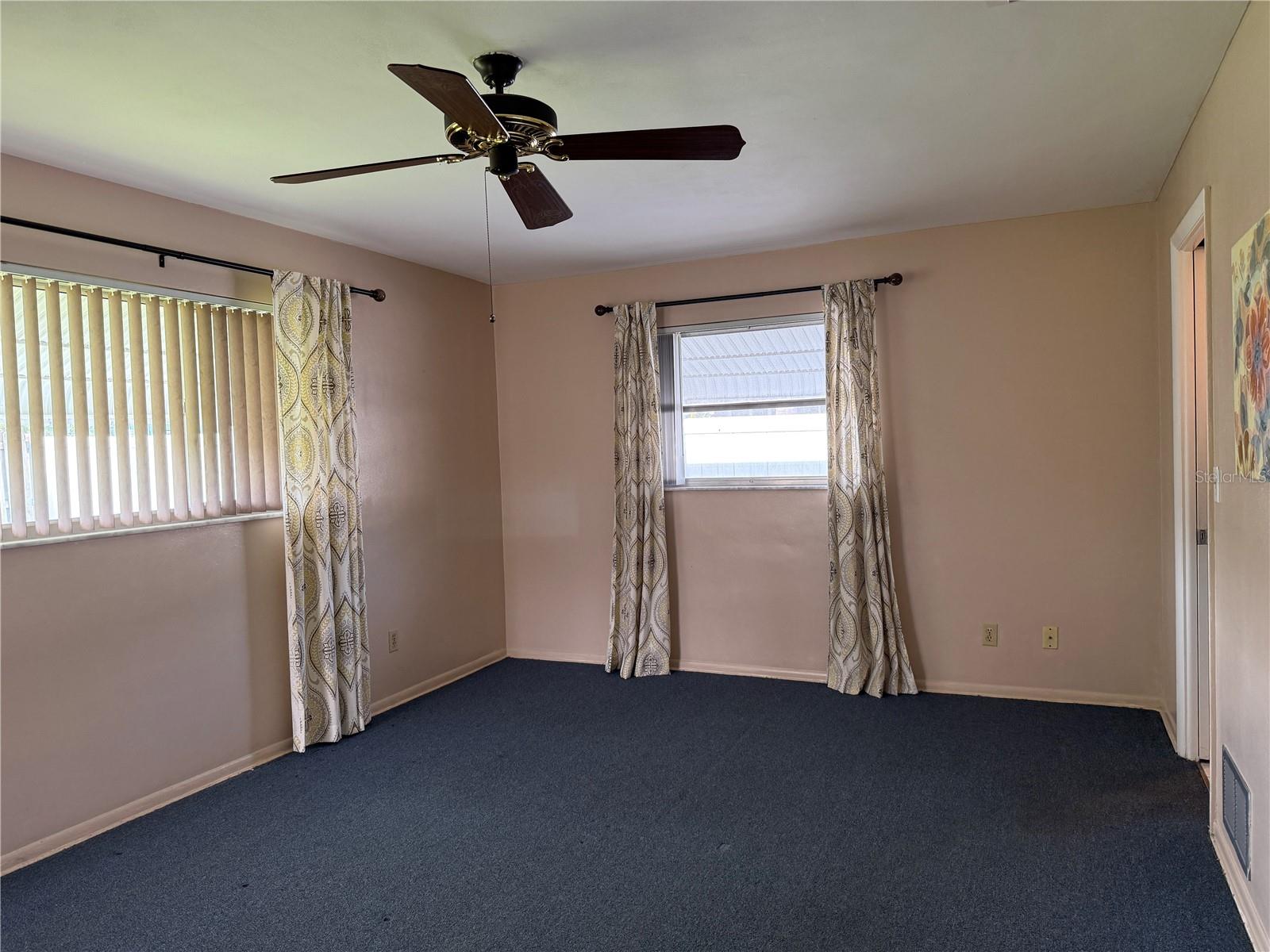 Spacious Master Bedroom on more private side of the house with en suite
