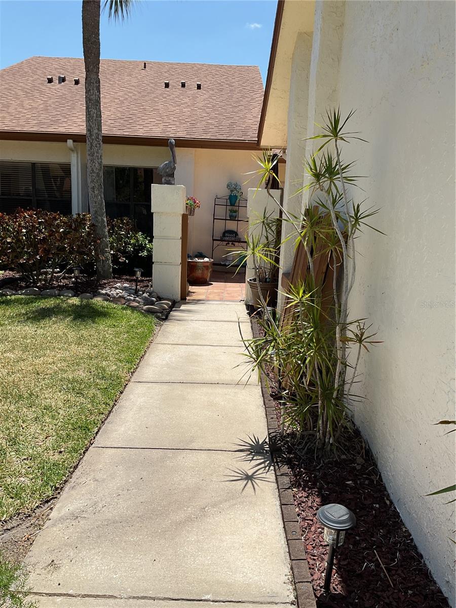 WALKWAY FROM GARAGE OR STREET TO COURTYARD ENTRANCE