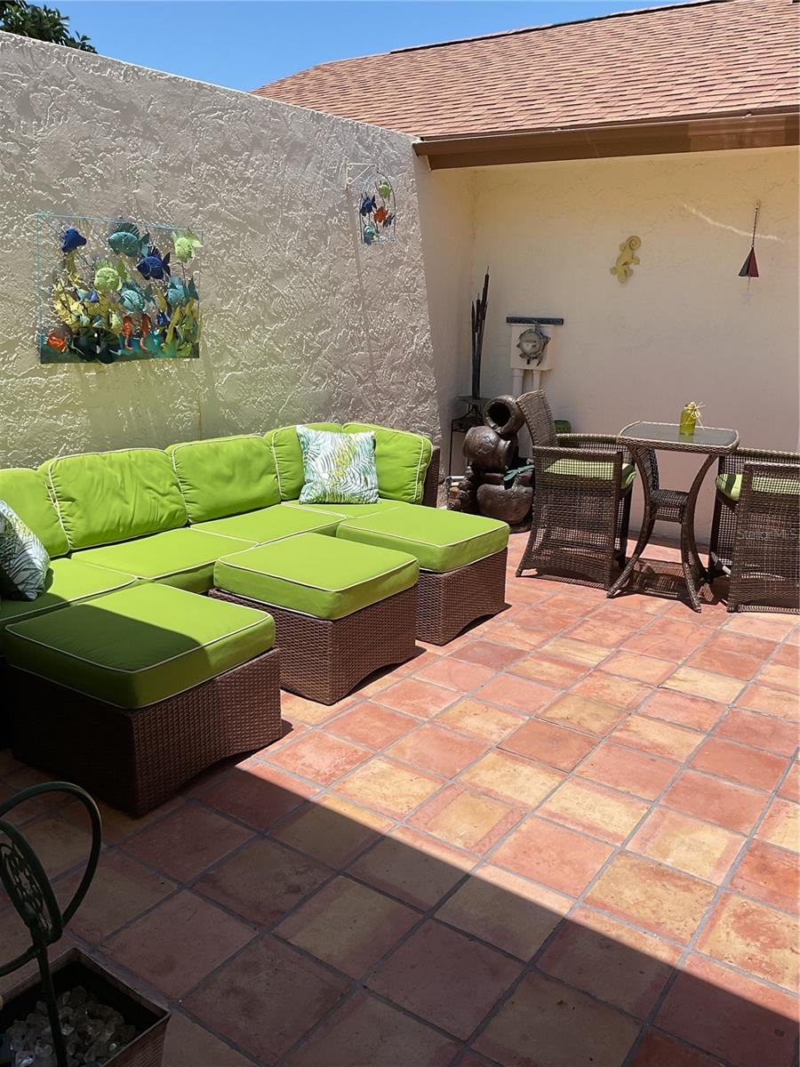 COURTYARD BETWEEN GARAGE AND FRONT DOOR