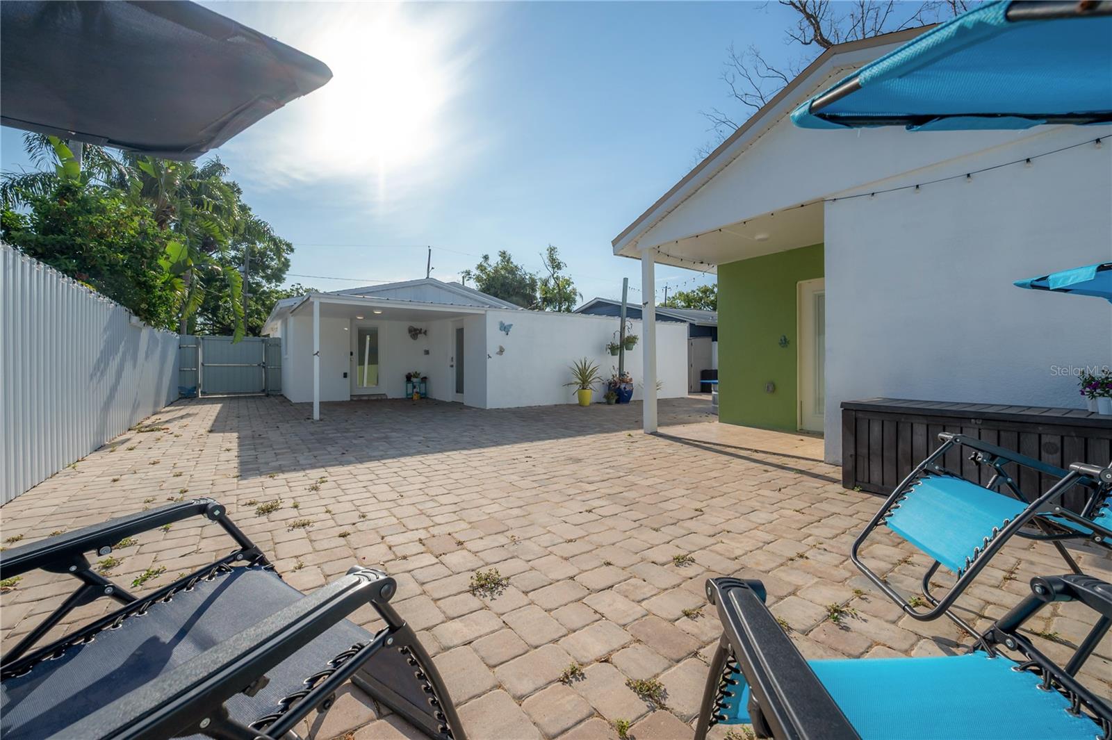 Paver covered rear area and Guest House