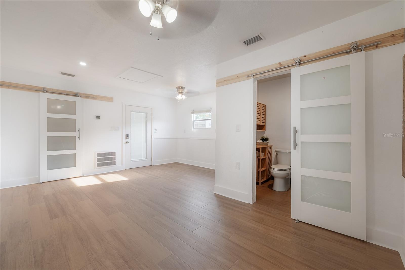 Guest House with bathroom, walk-in closet, and space for full kitchen