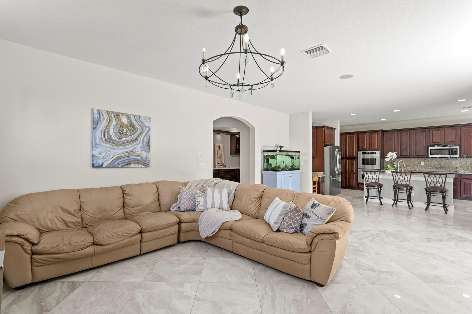 Open concept views from the family room towards the kitchen
