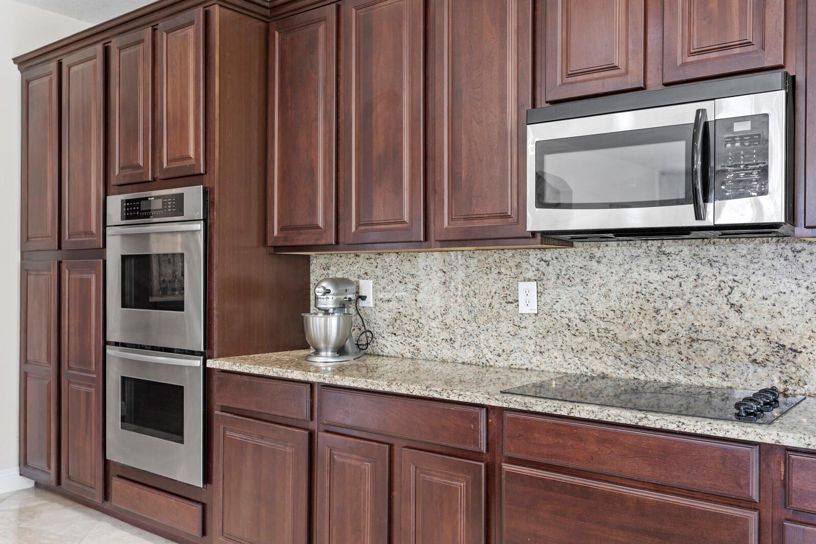 The chef will love preparing meals in the double Thermador convection ovens