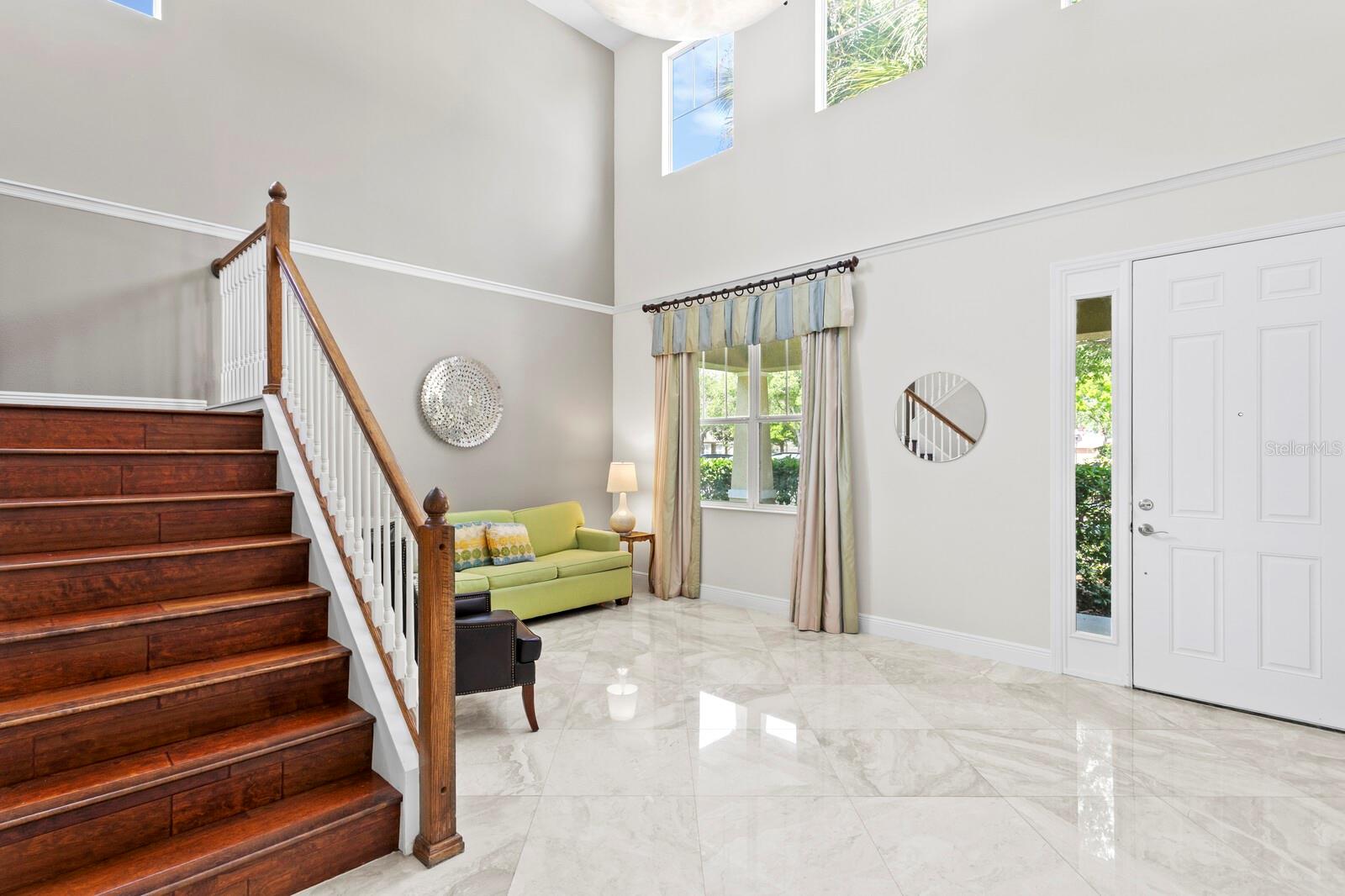 You'll love the 19ft ceilings in the foyer and formal living room