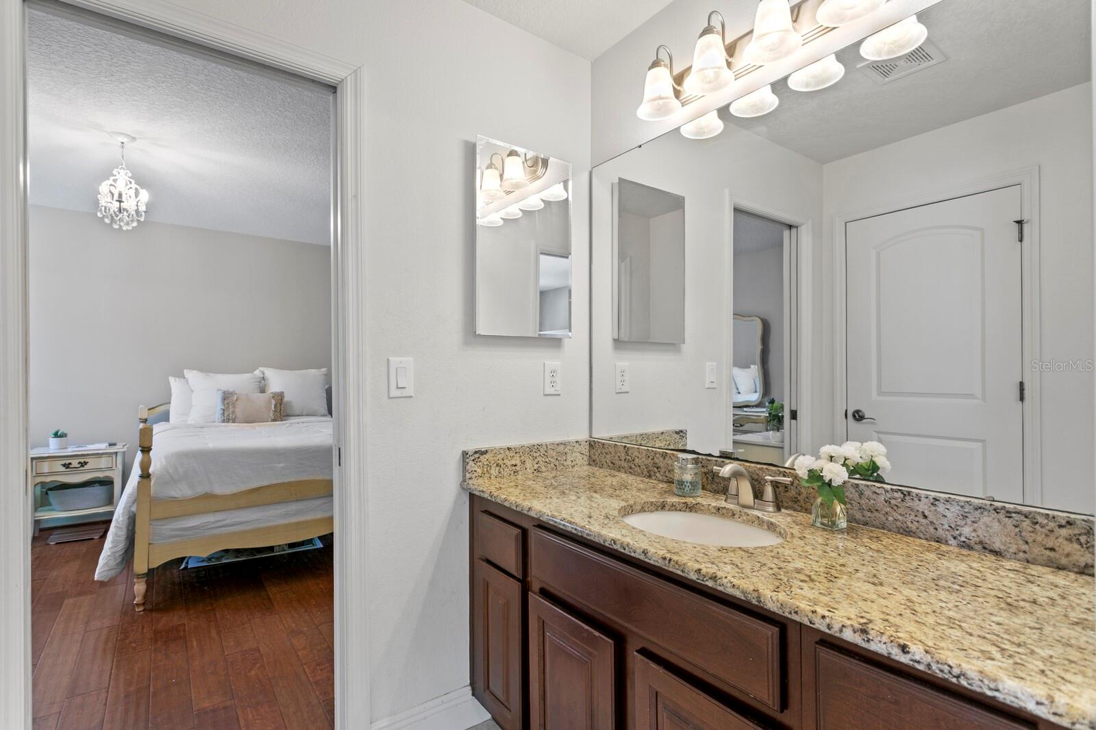 Jack-n-Jill full bath leads into the 4th bedroom