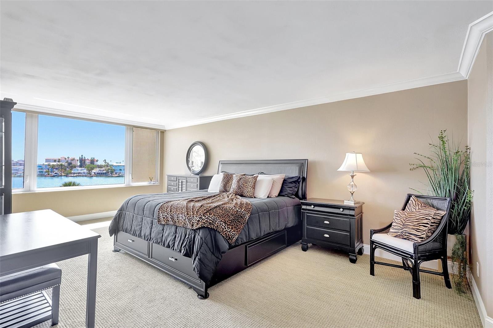 The Primary bedroom is spacious, again with that view!
