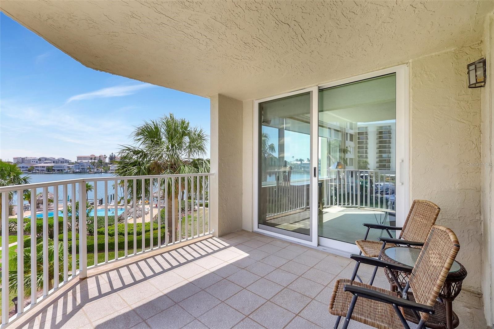 Enjoy you balcony overlooking the water and the pool